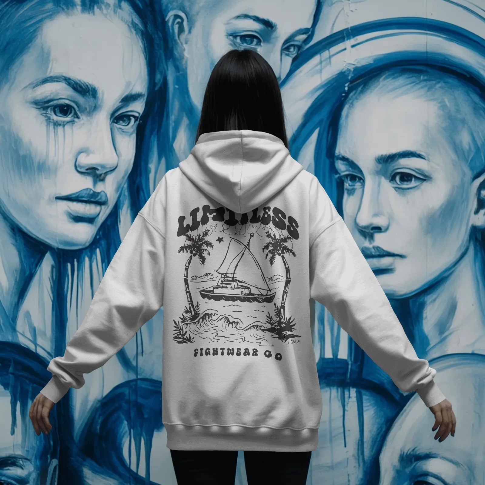 back-view-hoodie-mockup-in-front-of-expressive-graffiti-mural-with-hand-painted-faces-in-blue-0815