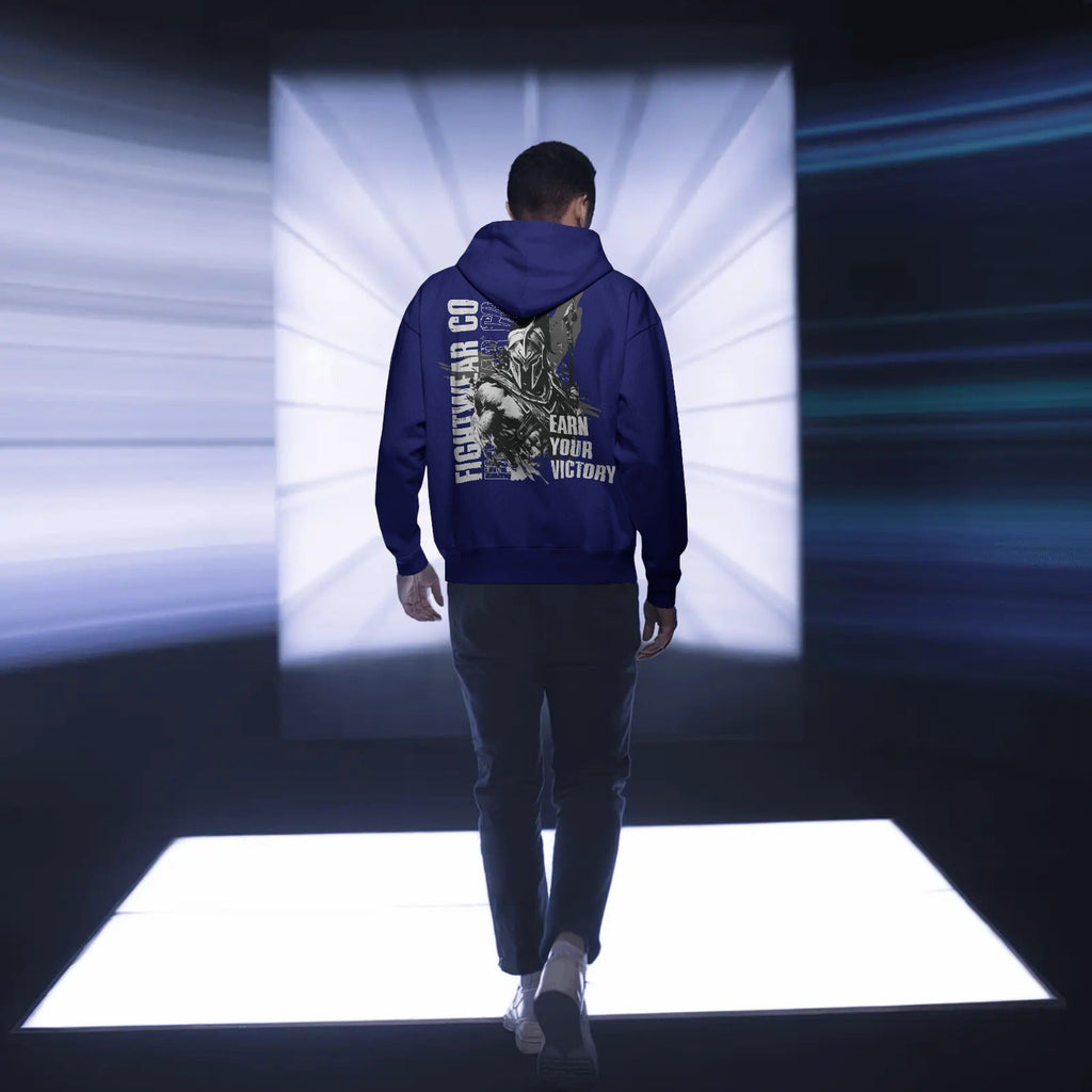 backview-hoodie-mockup-male-model-walking-towards-illuminated-white-square-platform-0768