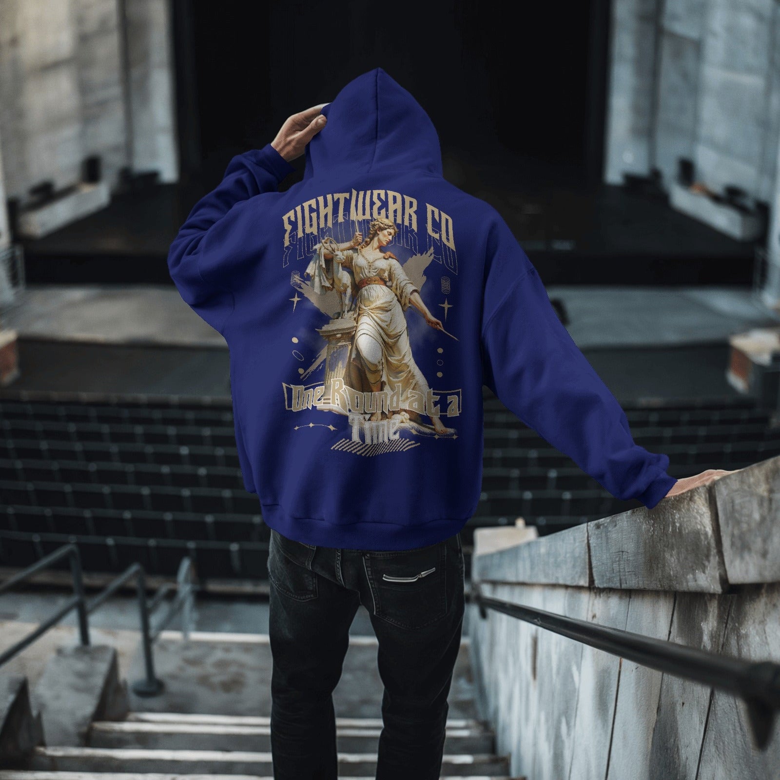 gritty-cityscape-hoodie-mockup-male-model-with-haunting-horror-design-in-dystopian-backdrop-0346