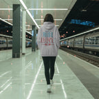 hoodie-mockup-on-woman-walking-in-subway-terminal-with-bright-lights-and-minimalist-urban-look-0786