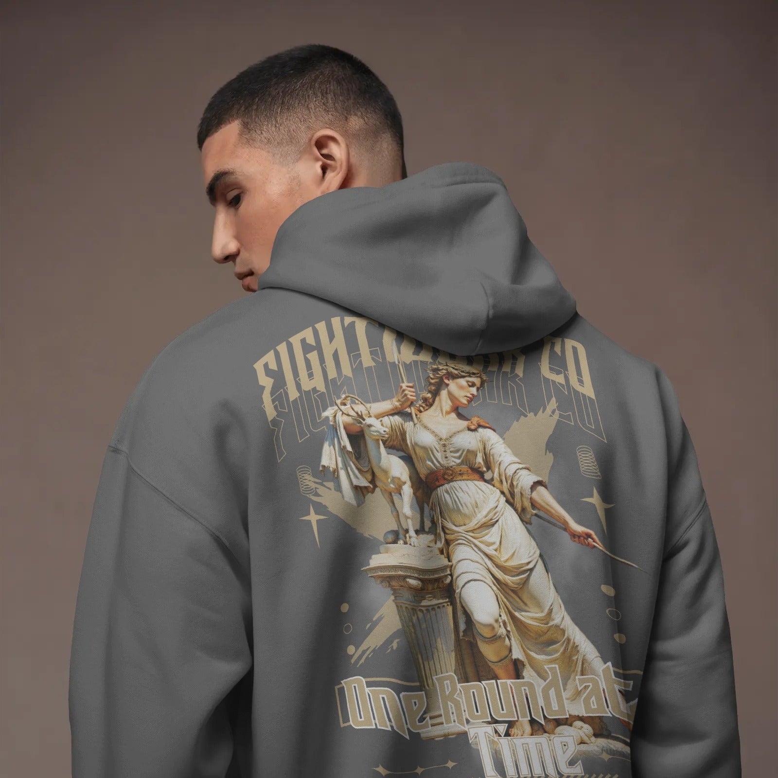 soft-shadow-hoodie-mockup-apparel-on-male-model-against-muted-studio-background-0464