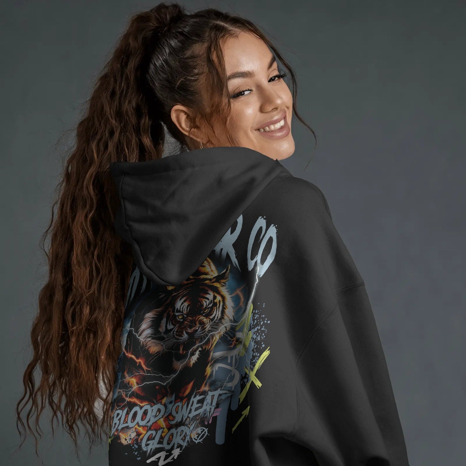 studio-lit-hoodie-mockup-female-model-smiling-in-hoodie-back-view-with-soft-light-0477